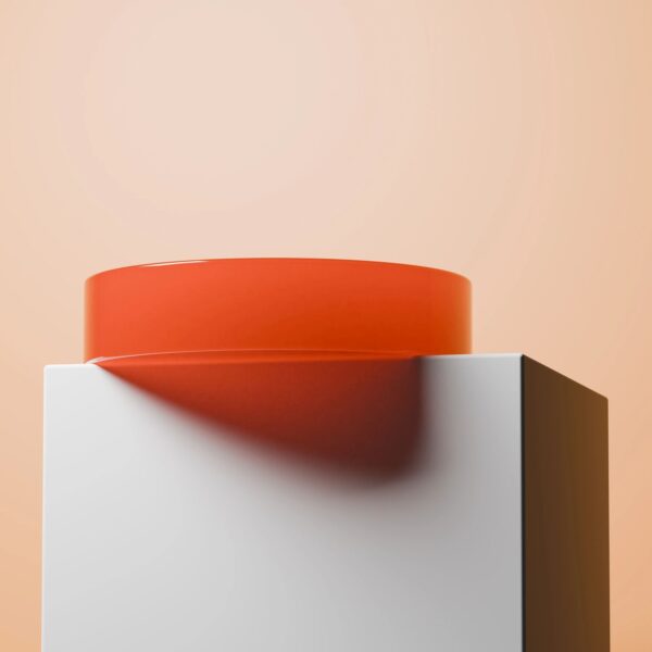 Blush pastel sculptural bubble cube candle on a neutral background