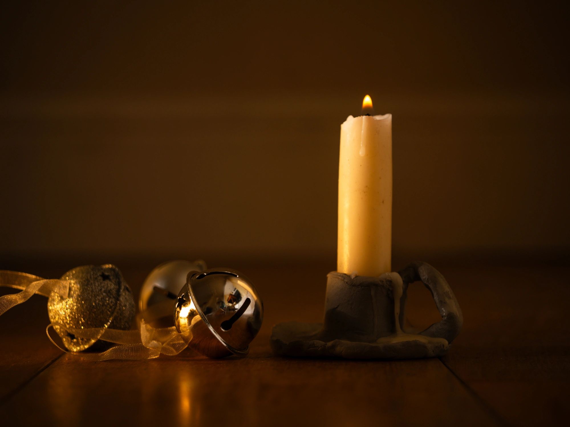 Candle styled in a cozy home setting